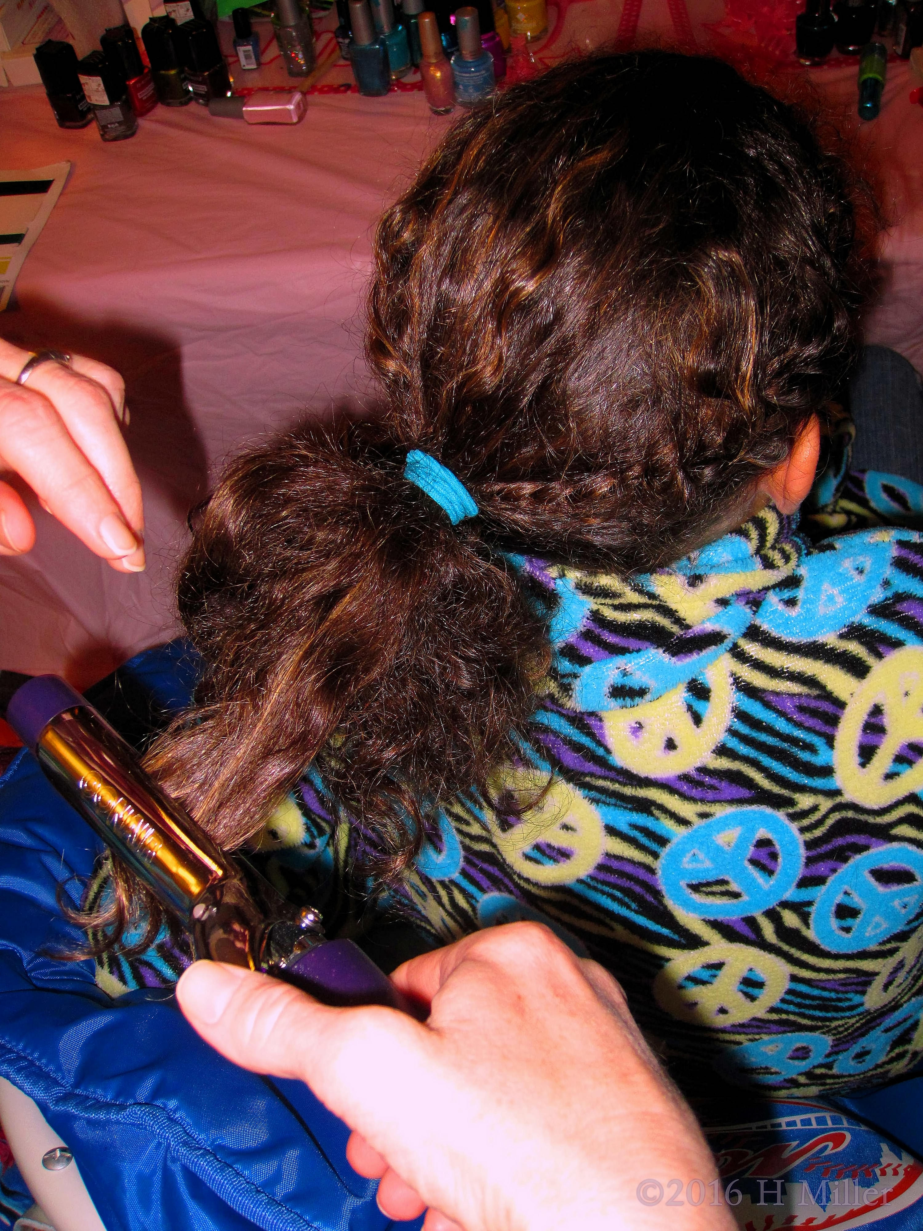 Getting Her Hair Curled For Her Kids Hairstyle. 