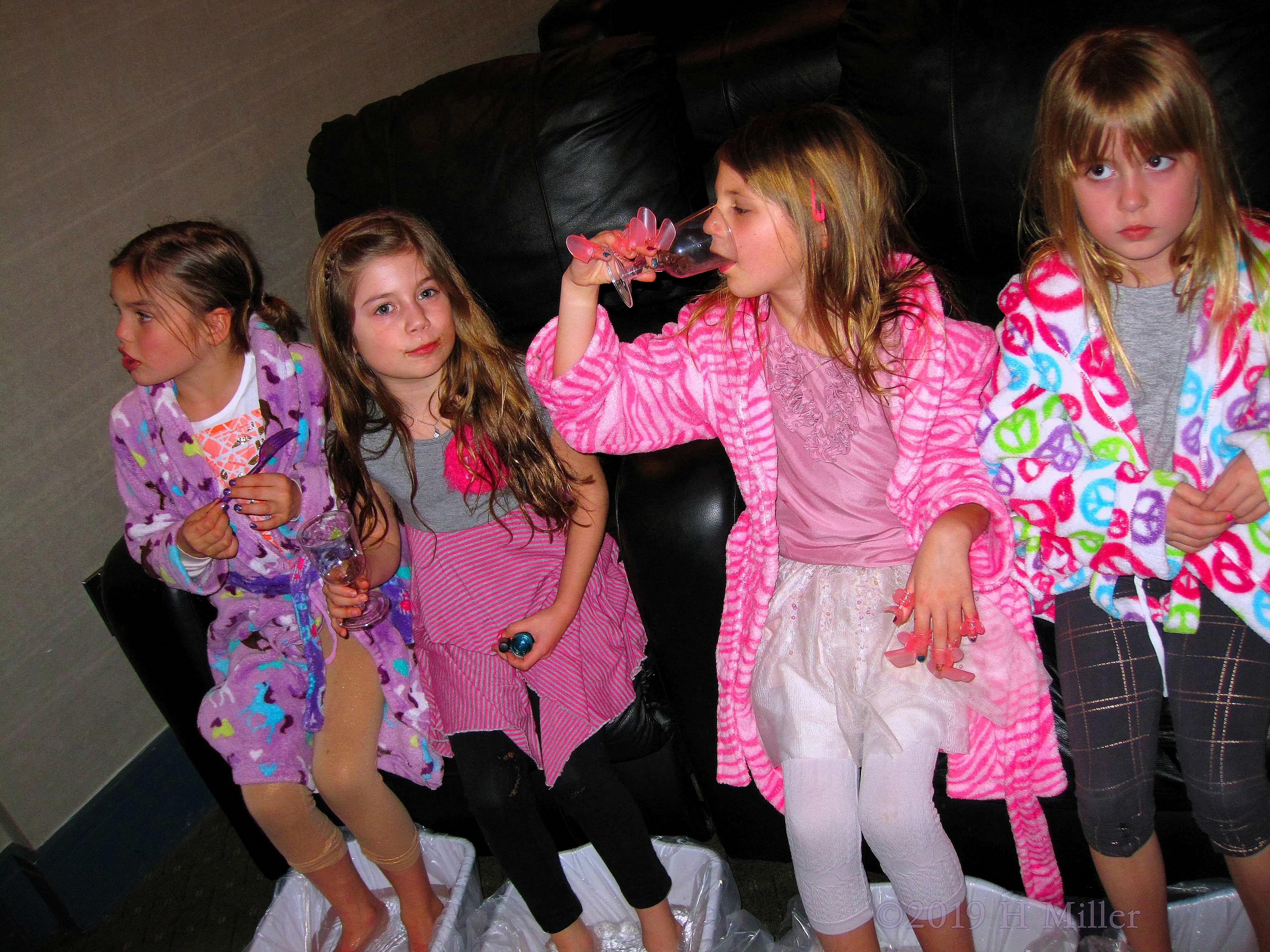 Enjoying Party Beverages And Girls Pedicures Enjoying Party Beverages And Girls Pedicures