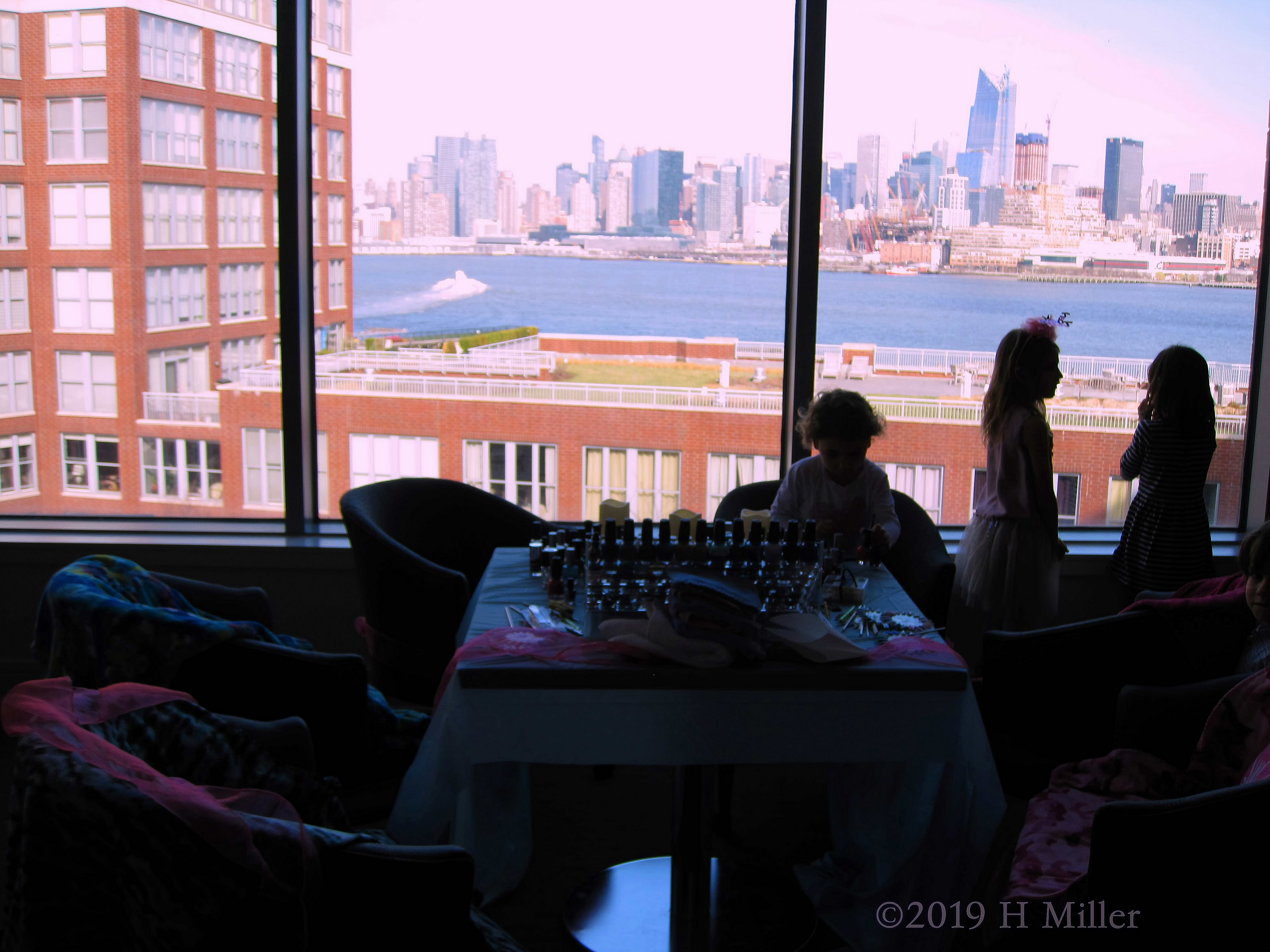 Party Guests Getting Kids Mini Manicures Done Party Guests Getting Kids Mini Manicures Done