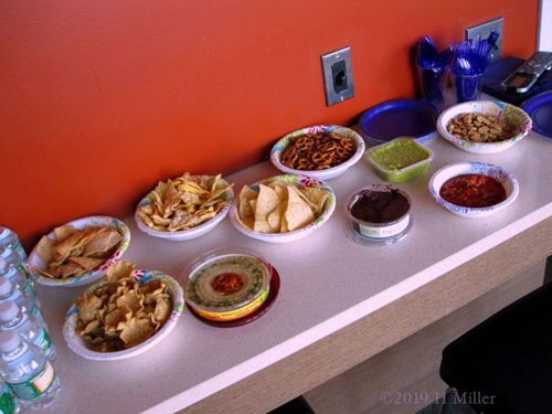 Assortment Of Chips, Pretzels And Dips