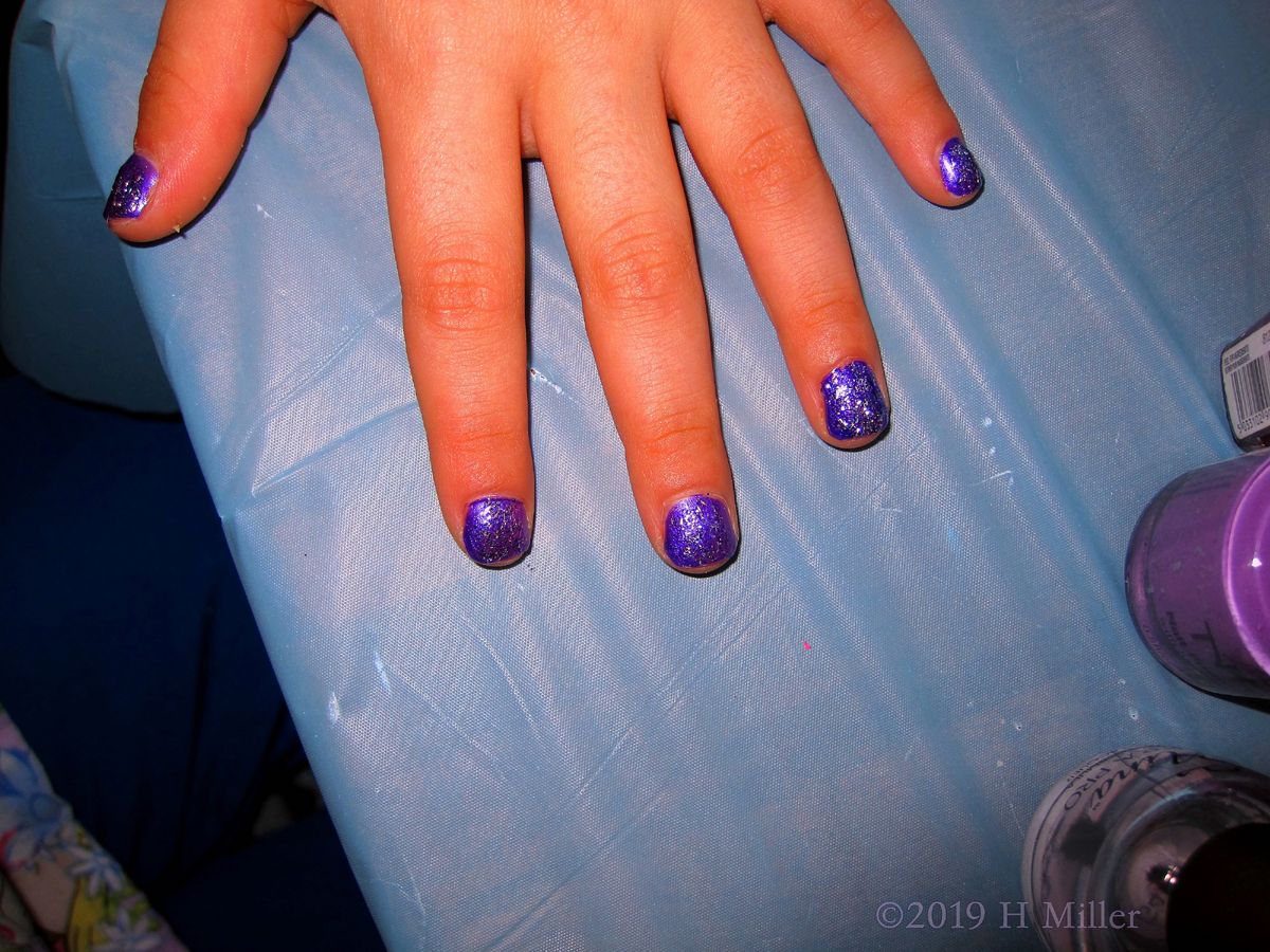 Another Sparkly Girls Manicure Creation With Purple Polish And Glitter Overlay 