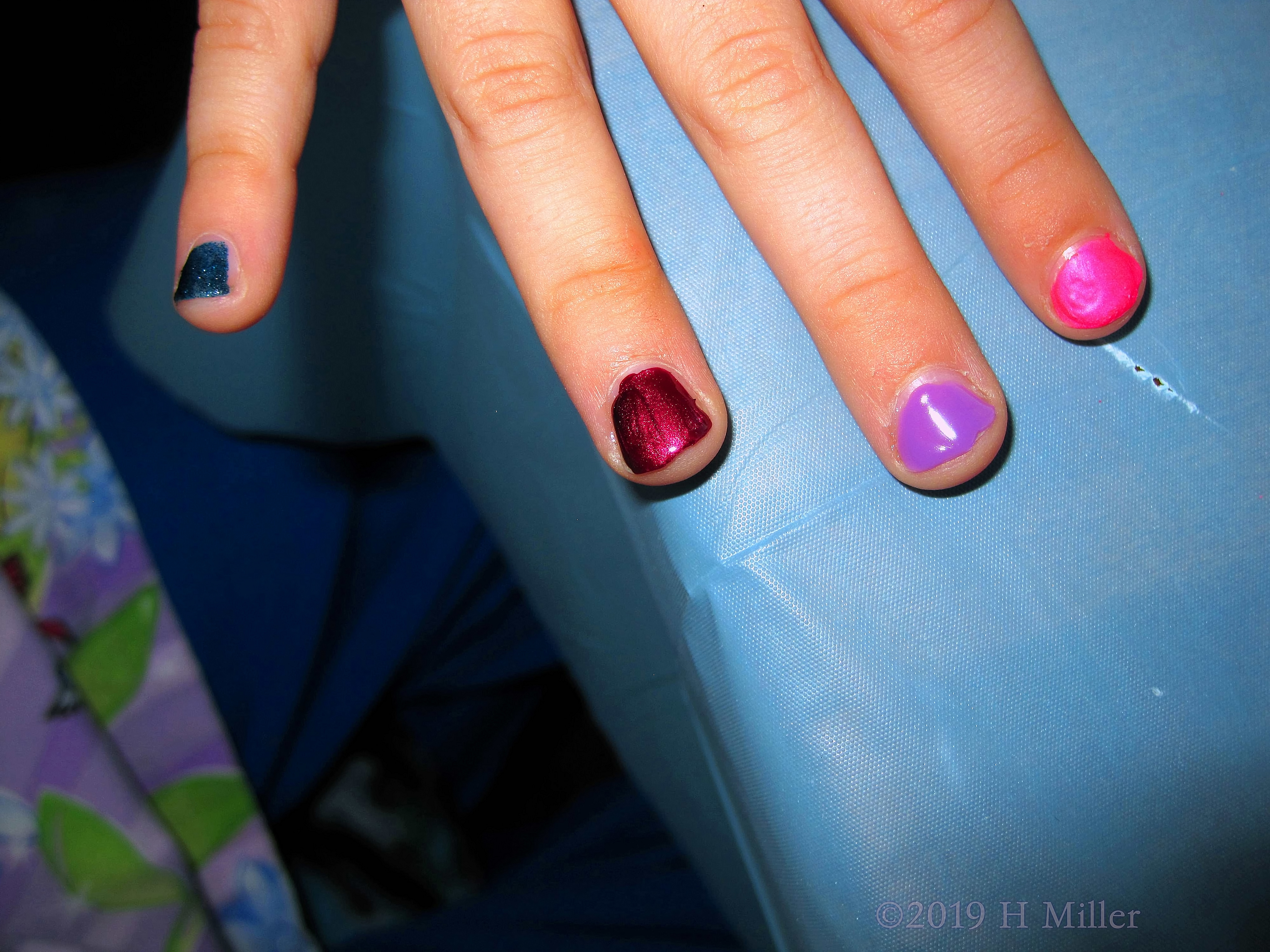 Beautiful Girls Manicure With An Assortment Of Colors Beautiful Girls Manicure With An Assortment Of Colors