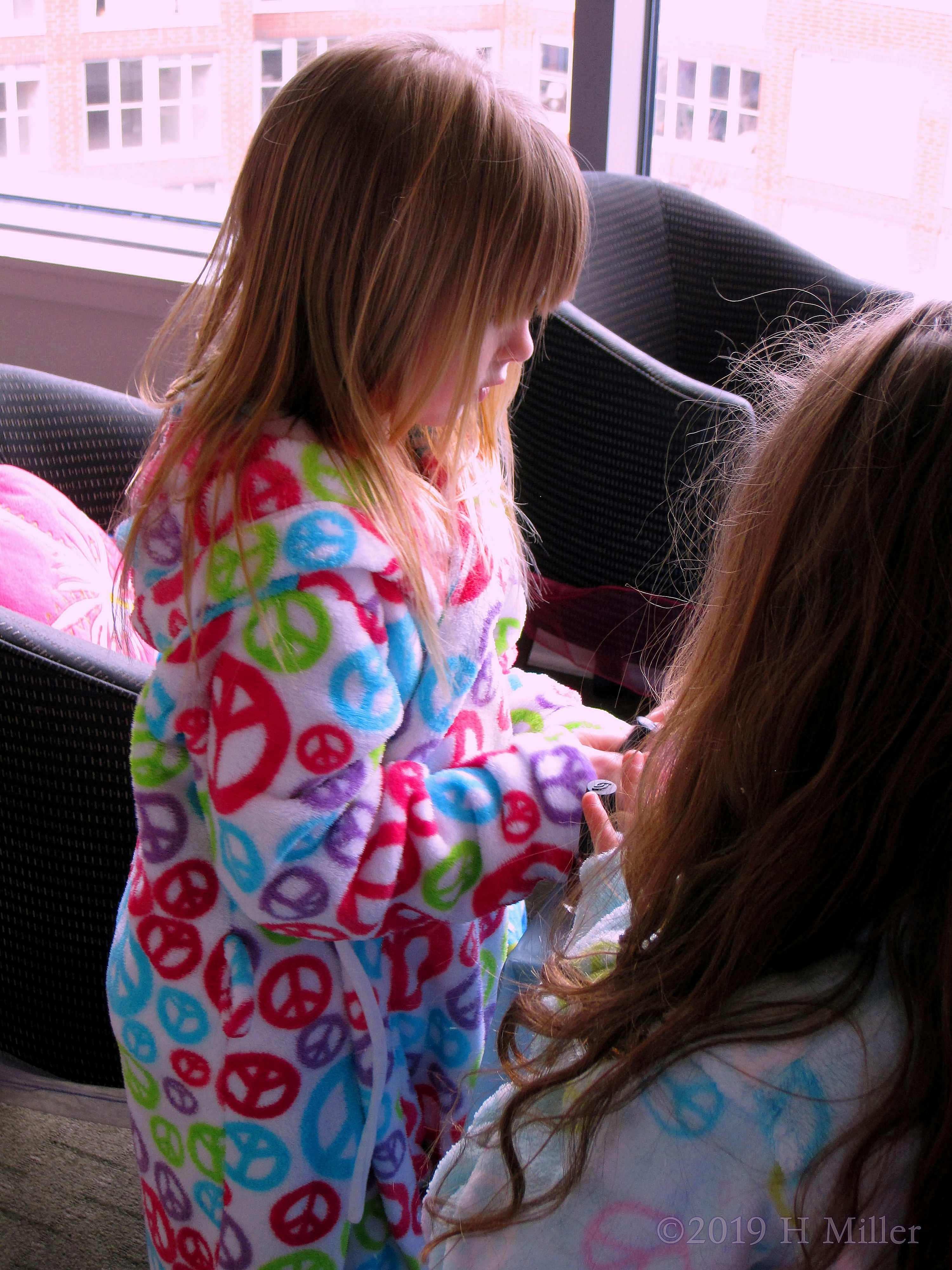 This Party Guest Has Chosen Her Favorite Kids Spa Robe!