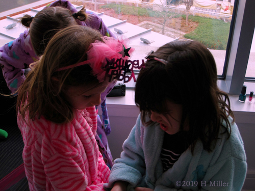 Friends Help Each Other With Their Spa Robes Friends Help Each Other With Their Spa Robes