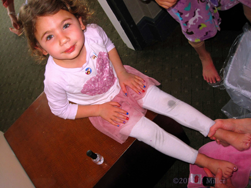 Showing Off Her Kids Manicure And Pedicure At The Spa Party