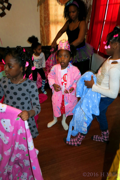 Putting On Their Spa Party Robes. Putting On Their Spa Party Robes.