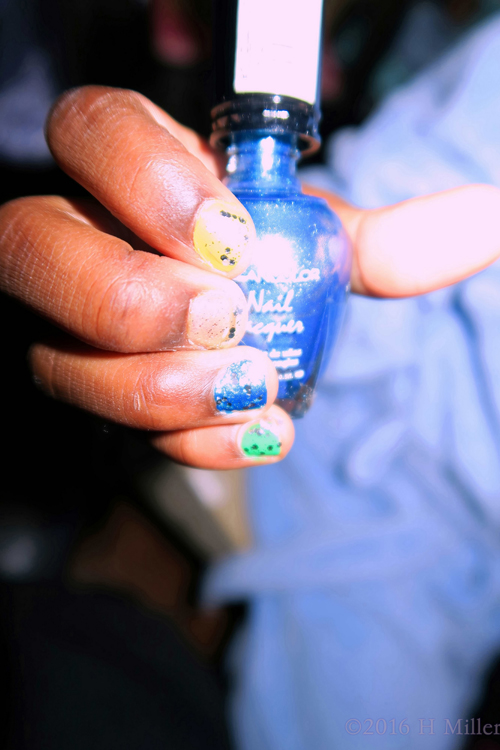 Holding The Polish Bottle That Was Used For The Design. Holding The Polish Bottle That Was Used For The Design.