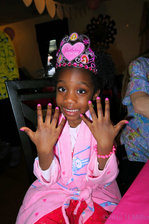 Showing Her New Pink Nails