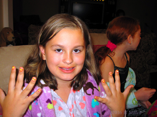 Smiling About Her Mini Mani