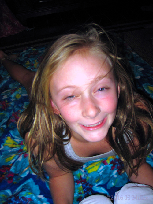 Smiling During Her Kids Massage Smiling During Her Kids Massage