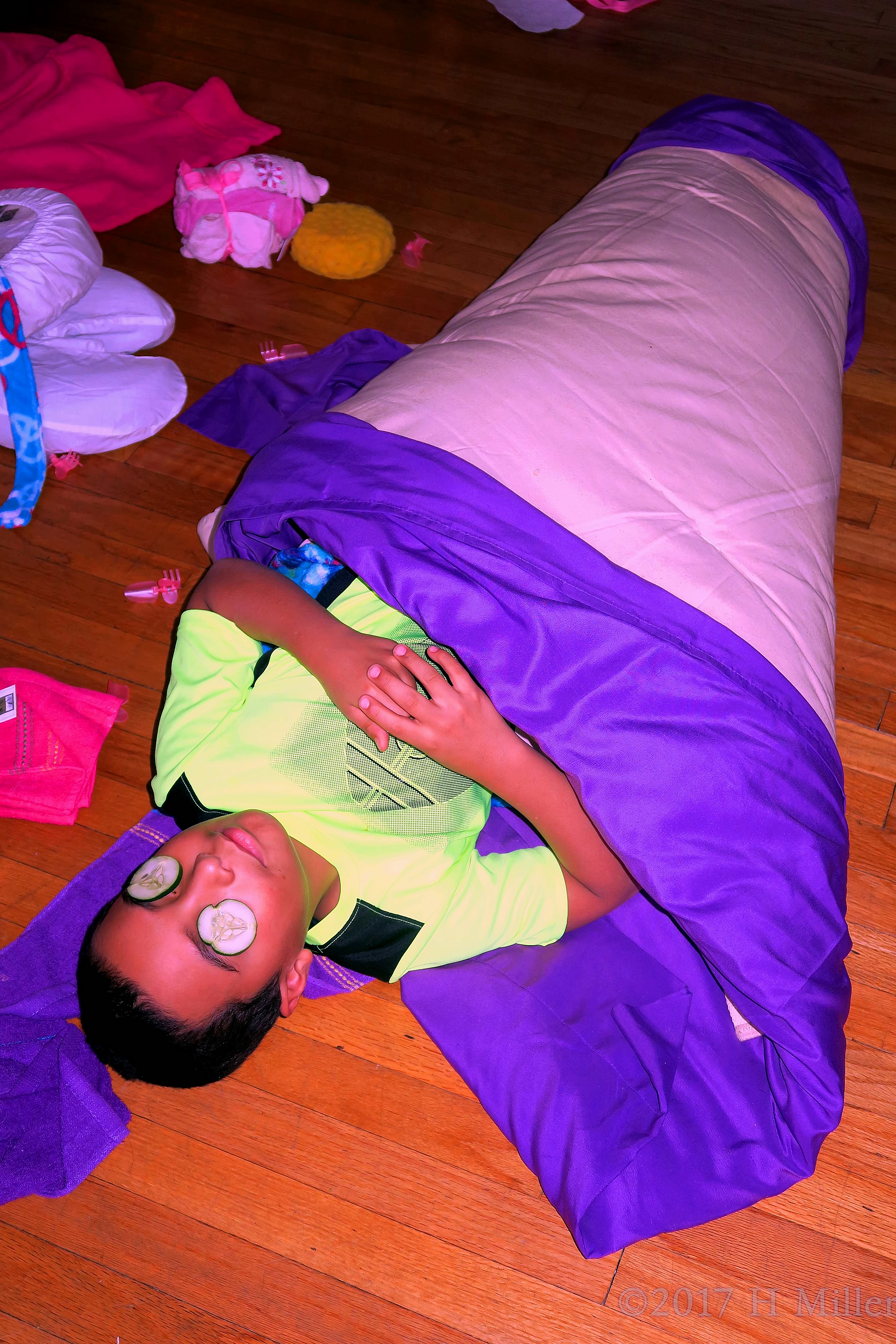 Cuddled In The Kids Massage Mat With Cukes On His Eyes! Cuddled In The Kids Massage Mat With Cukes On His Eyes!