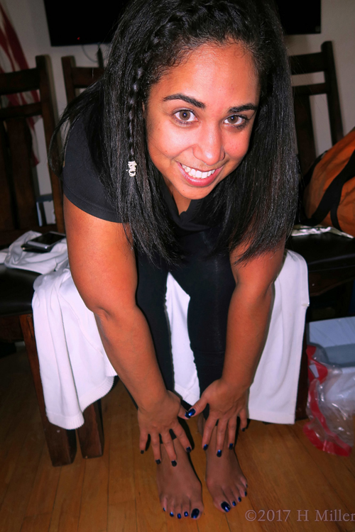 Mom Smiles With Her New Manicure And Pedicure. Mom Smiles With Her New Manicure And Pedicure.