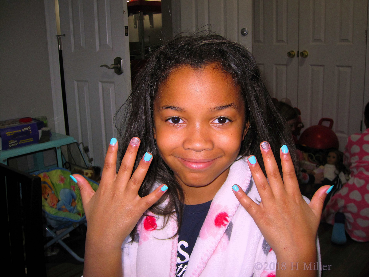 Posing With Blue And Glitter Polish Manicure For Kids! 
