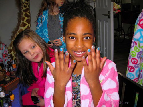Kids Spa Party Guest Posing With Sparkly Kids Mini Mani