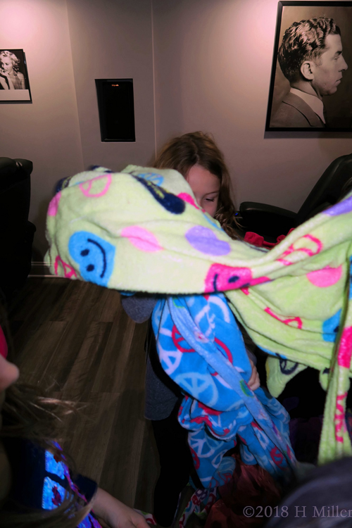 Peace Signs And Smiles! Party Guests Pick Their Spa Robes! Peace Signs And Smiles! Party Guests Pick Their Spa Robes!