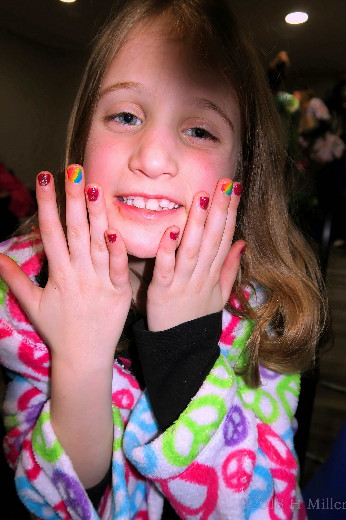 Posing With A Multicolored Kids Manicure! 