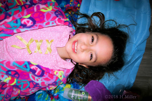 Beaming On The Facial Mat! Party Guest Awaits Facial For Kids Beaming On The Facial Mat! Party Guest Awaits Facial For Kids