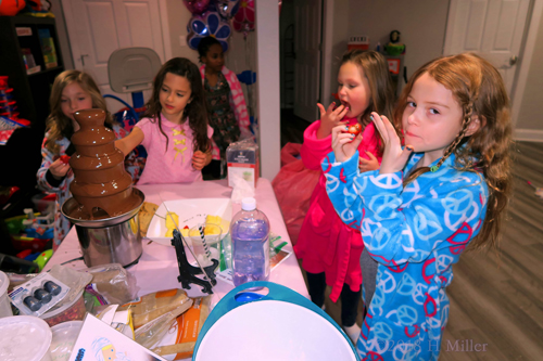Party Guests Partake Of The Chocolate Fountain!