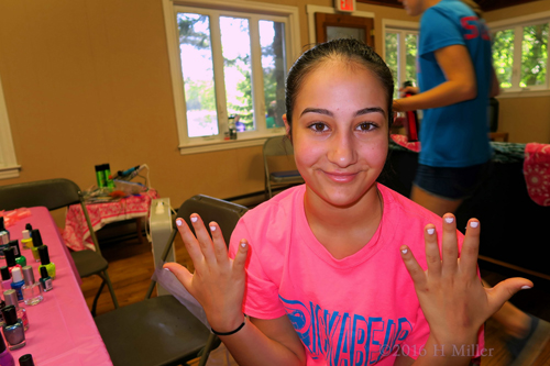 She's Loving Her White Kids Manicure