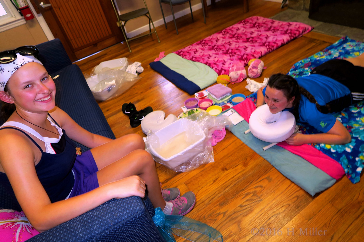 Smiling With Friends During Kids Massages 