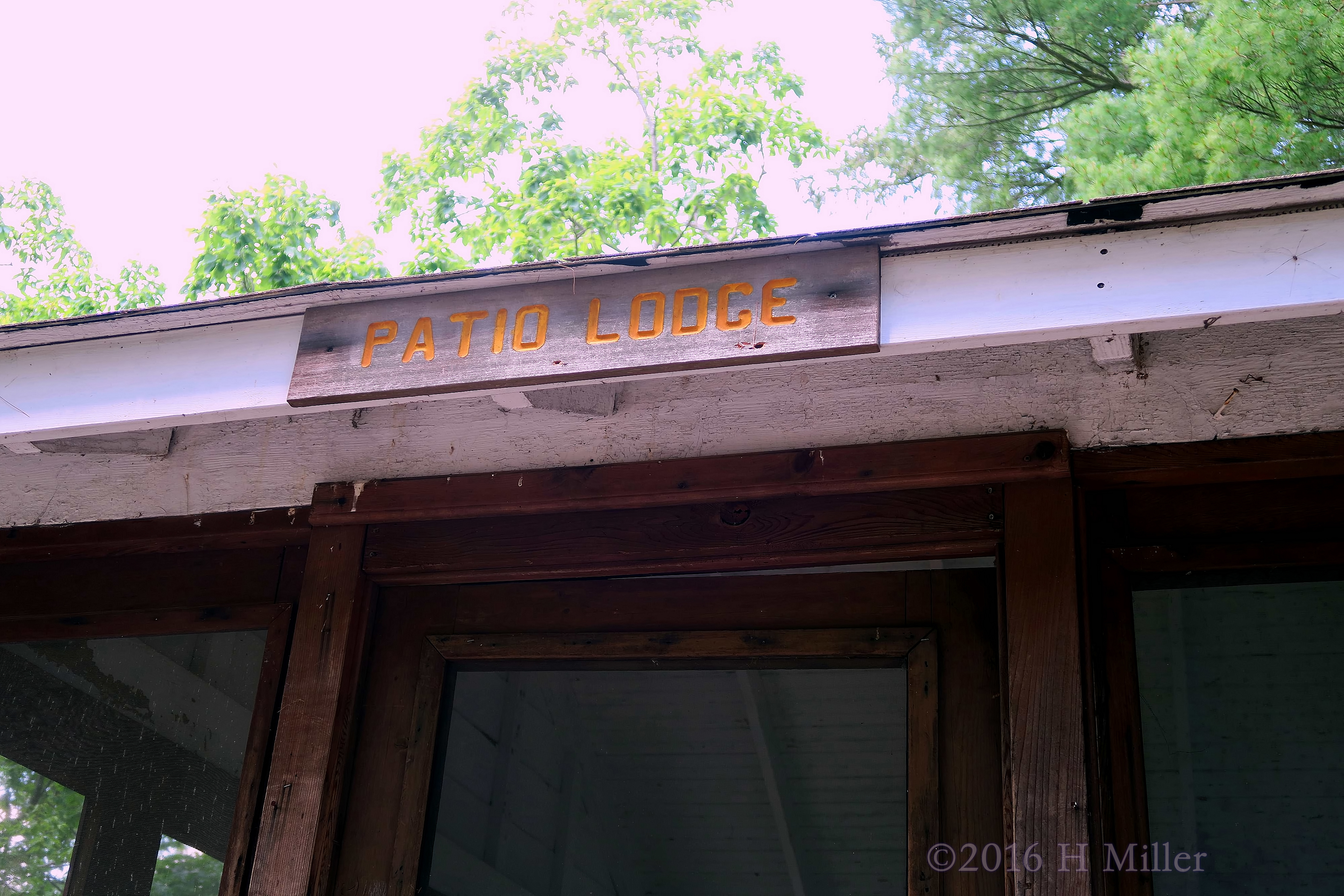 Patio Lodge Outside Sign. 