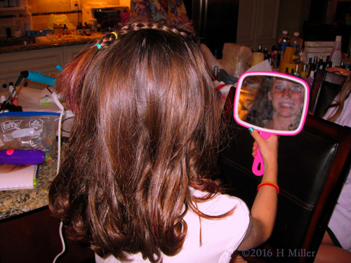 Checking Her New Hairstyle In The Mirror!