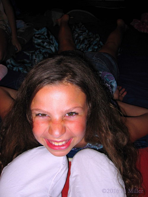 Smiling Big During Her Kids Massage Smiling Big During Her Kids Massage
