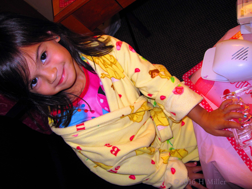 She's Having Fun Getting Her Manicure Done. She's Having Fun Getting Her Manicure Done.