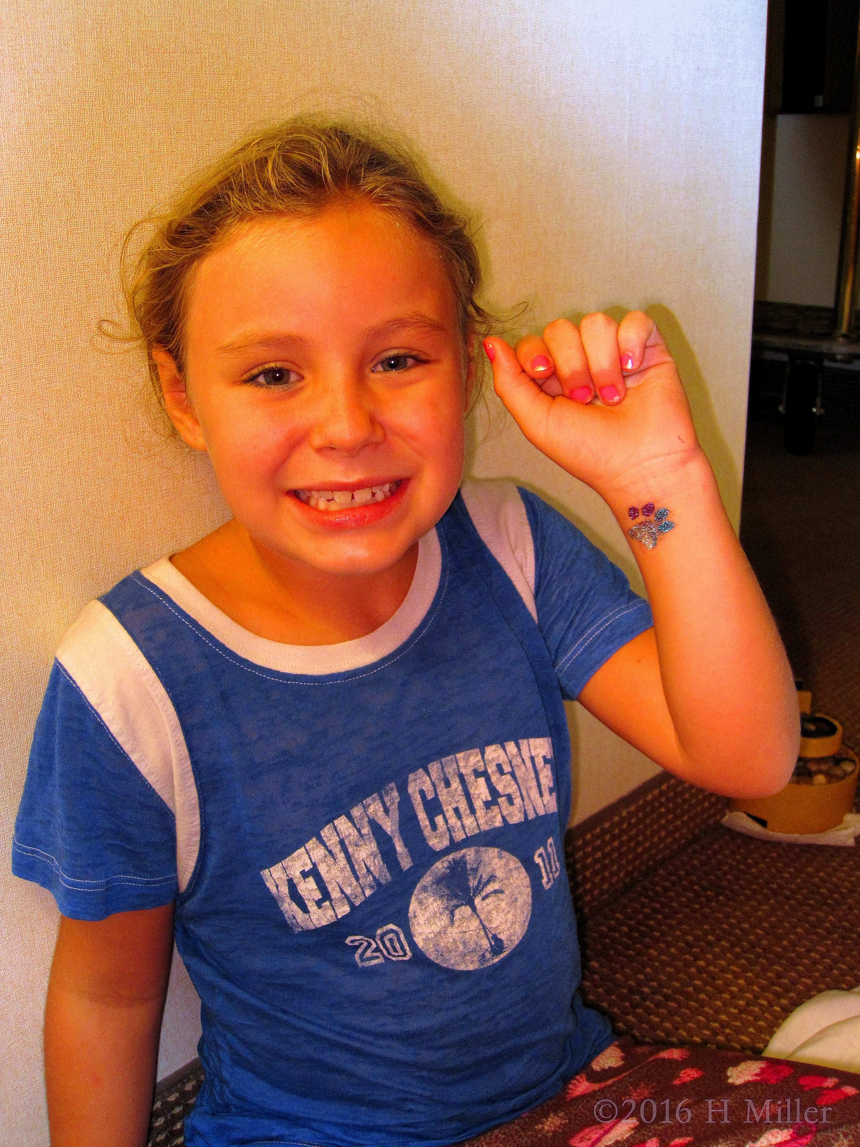 Smiling Big About Her Cute New Glittery Tattoo Smiling Big About Her Cute New Glittery Tattoo