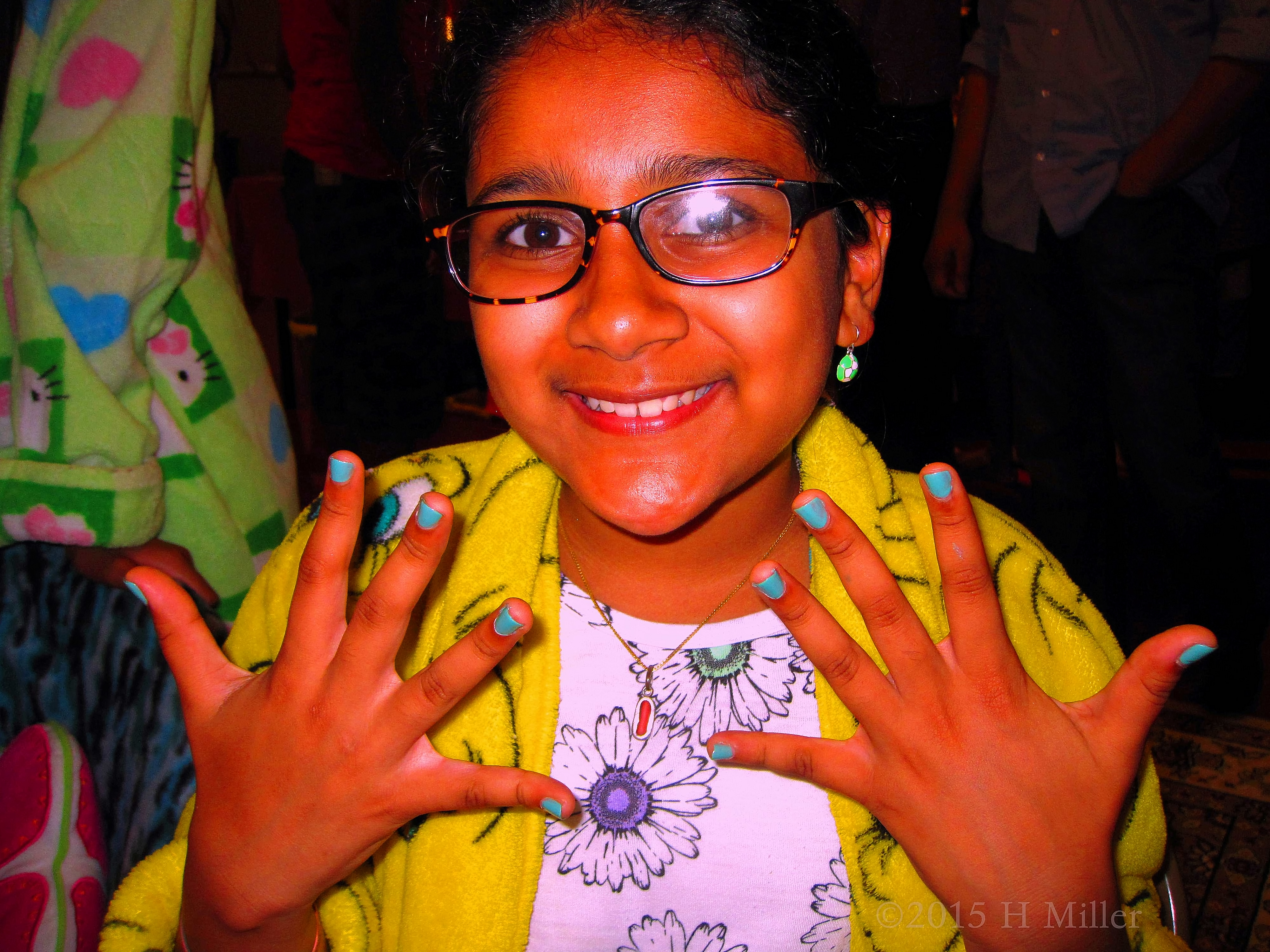 Happy With Her Cyan Mani At The Girls Spa Party. 