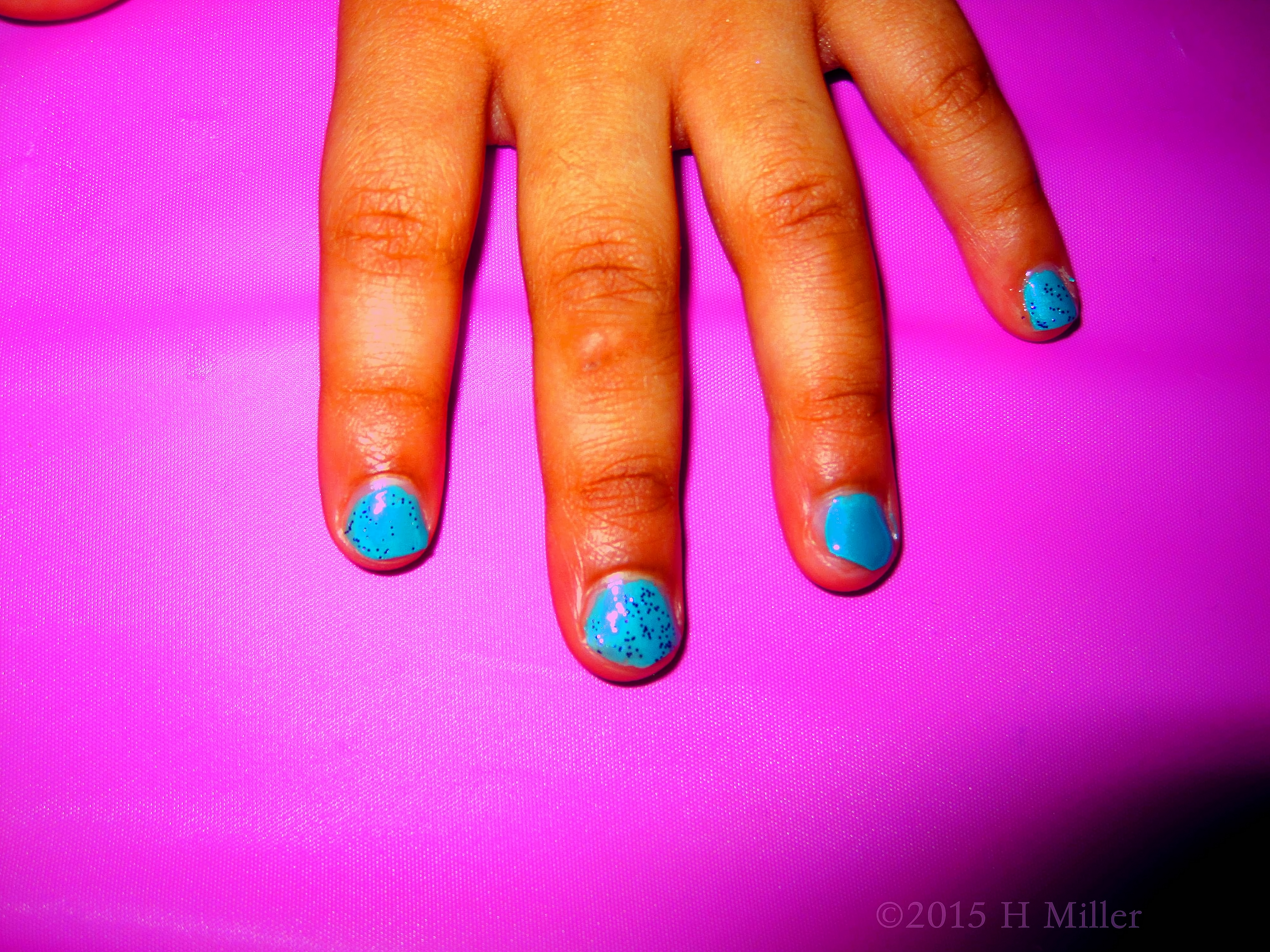 Sky Blue Polish With Glitter. Sky Blue Polish With Glitter.