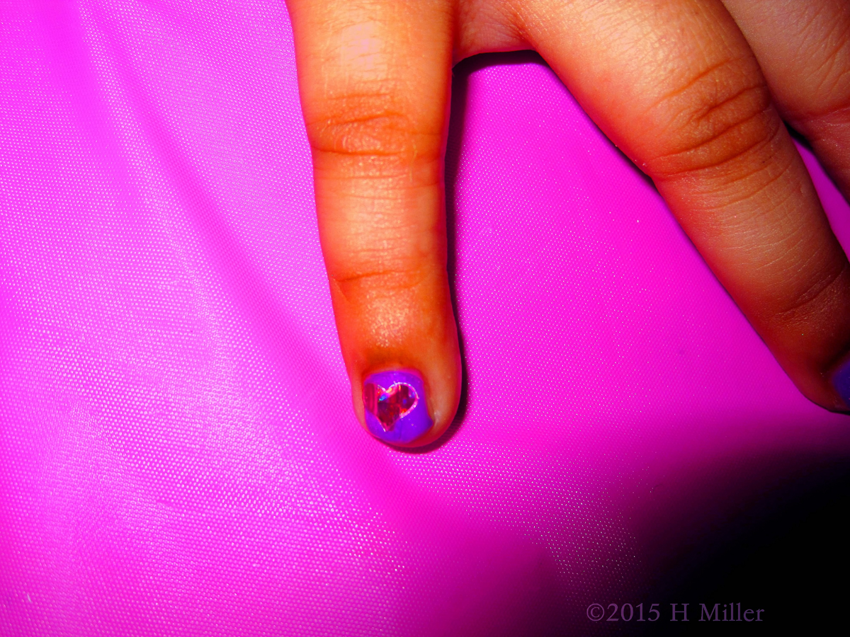 Heart Sticker Over Light Purple Polish. 