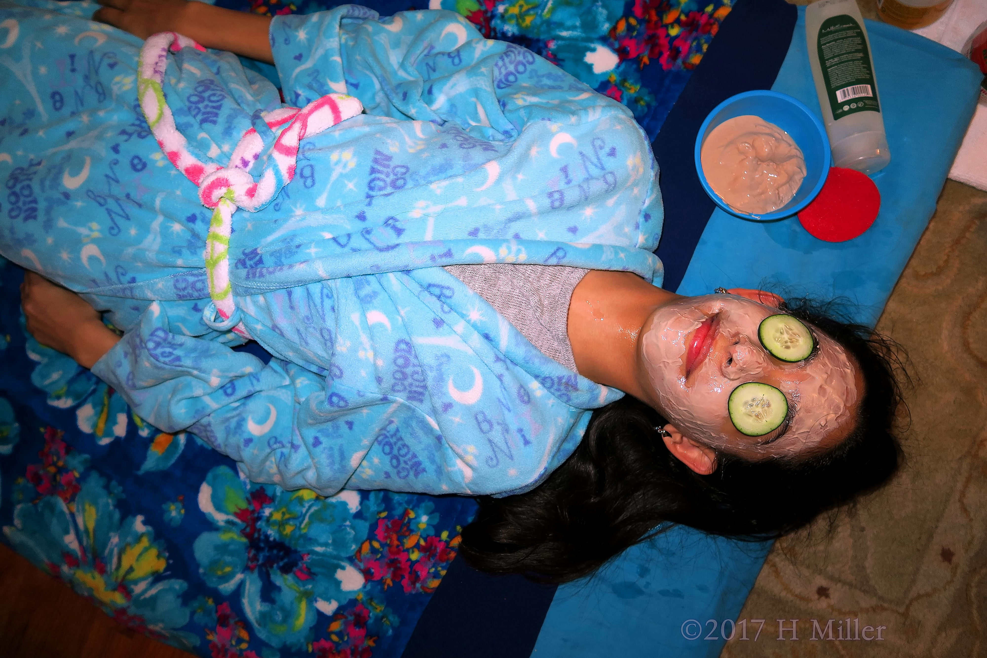 Birthday Girl Is Having A Yogurt Kids Facial With Cukes On Her Eyes Birthday Girl Is Having A Yogurt Kids Facial With Cukes On Her Eyes