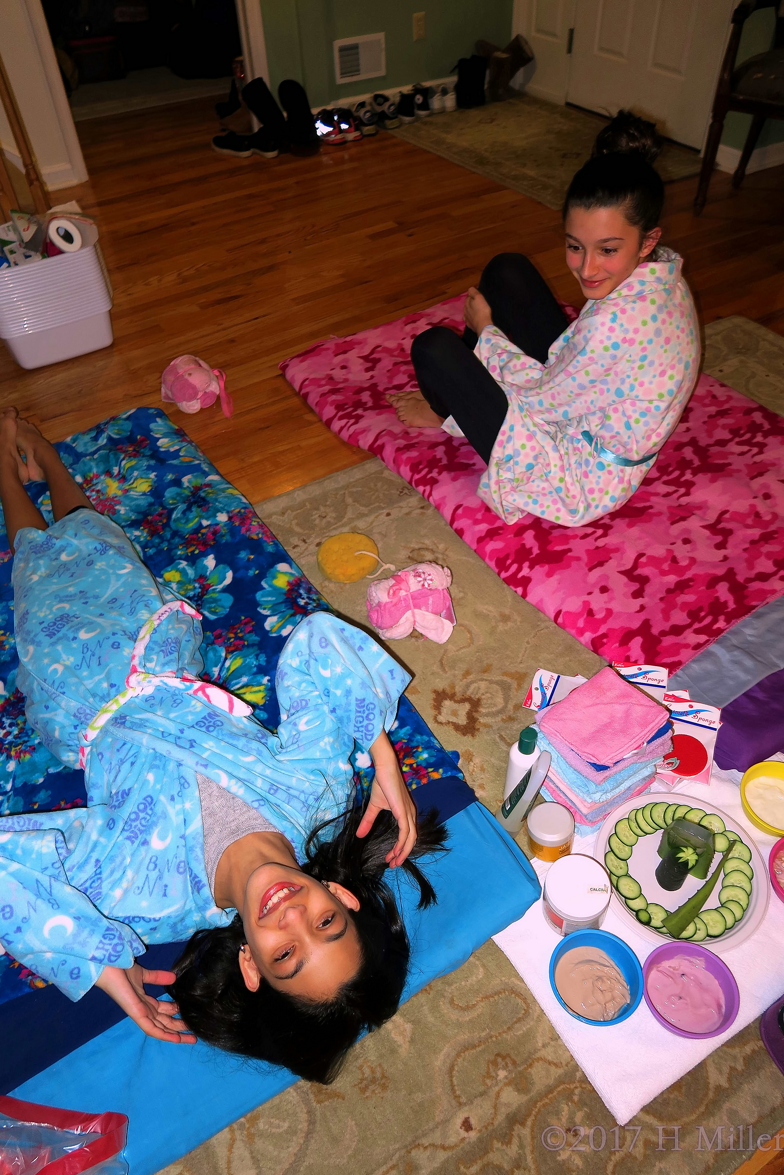 Birthday Girl Is Laughing With Her Friend At The Spa Party 