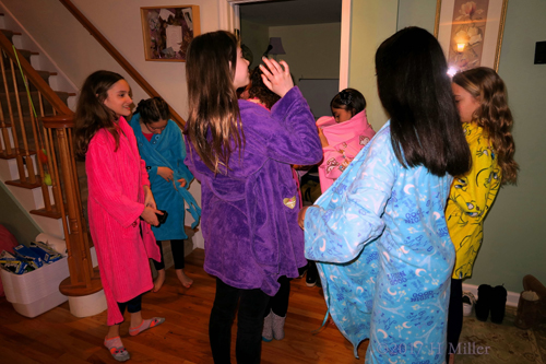 Girls Are Excited In Their Spa Robes