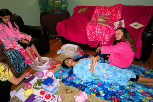 Girls Having Pedicures And Kids Facials Together Girls Having Pedicures And Kids Facials Together