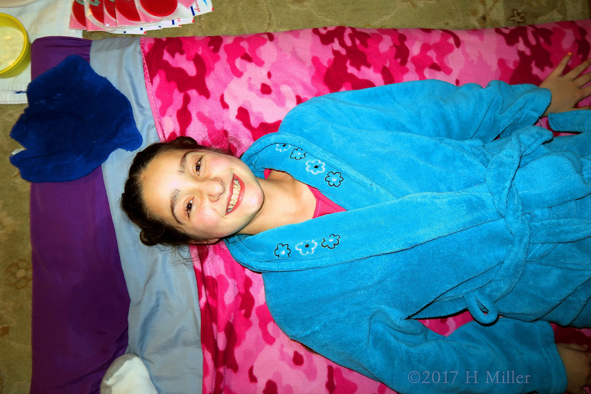 Happy Girl In A Blue Spa Robe 