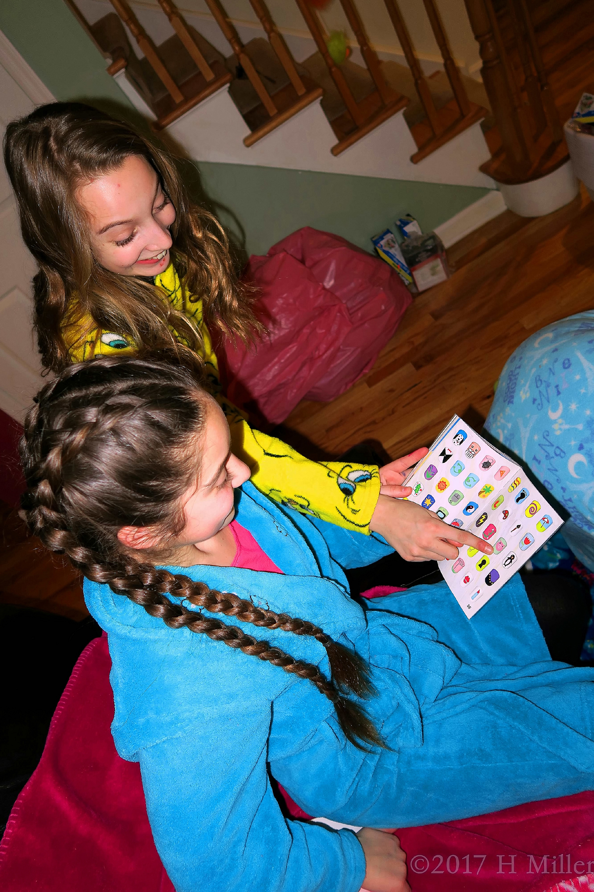Smiling Girl Is Selecting Stickers For The Spa Birthday Card! 