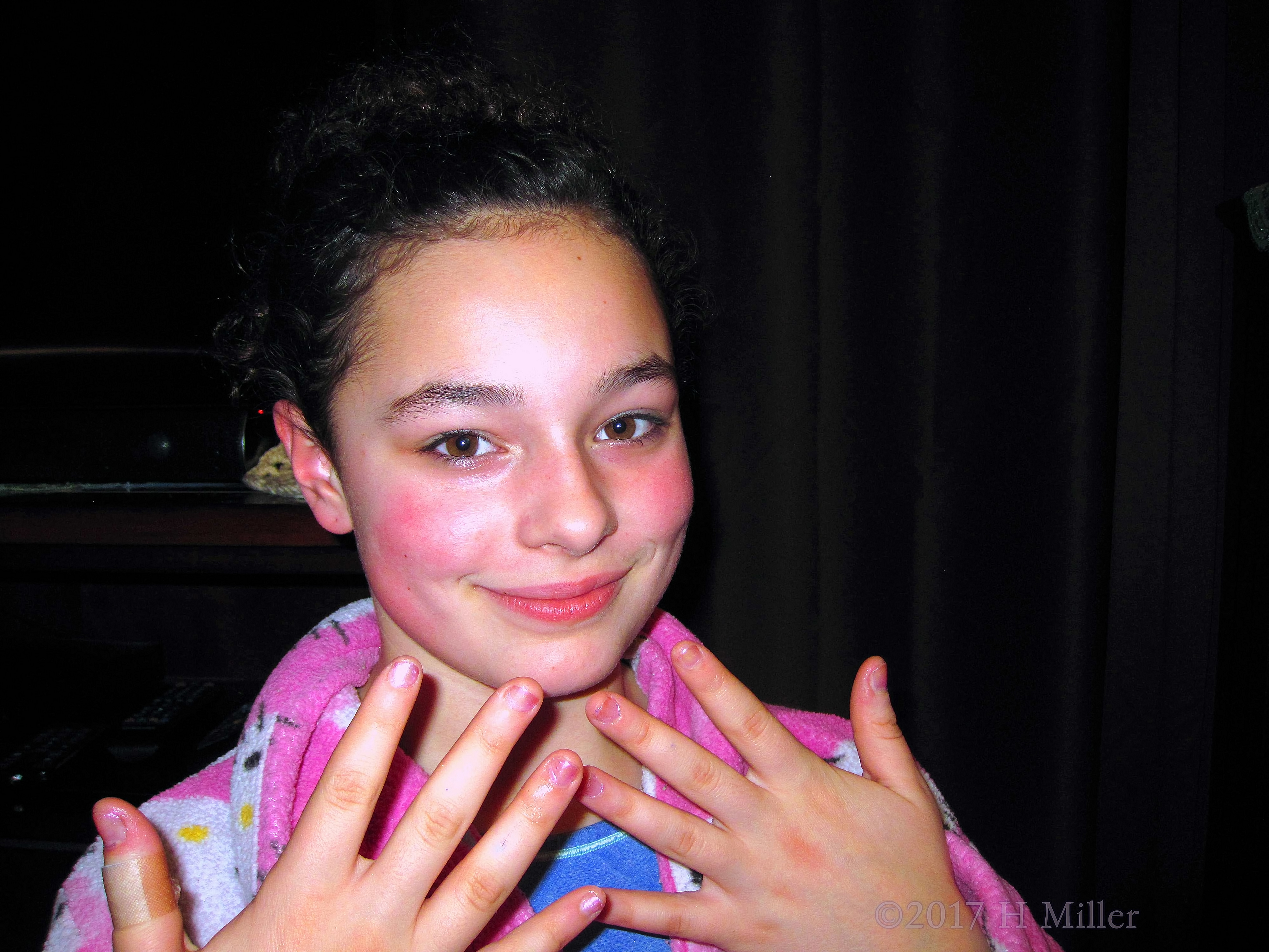Showing Her Beautiful Pink Kids Manicure Showing Her Beautiful Pink Kids Manicure