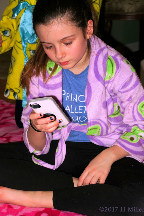 Girl Checking On Her Mobile Girl Checking On Her Mobile