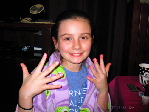 Happy Girl Showing Her Beautiful Kids Manicure