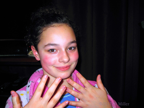 Showing Her Beautiful Pink Kids Manicure