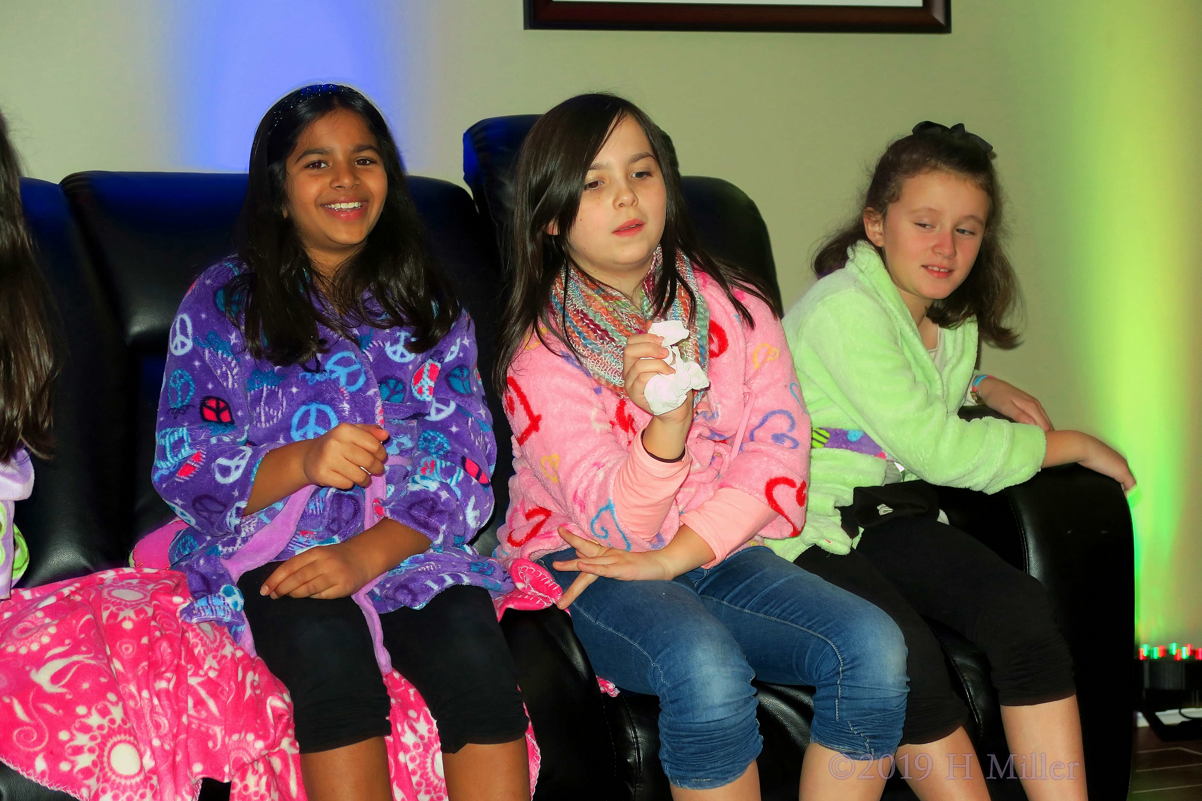 Happy Guests In Their Colorful Spa Robes Happy Guests In Their Colorful Spa Robes