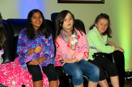 Happy Guests In Their Colorful Spa Robes Happy Guests In Their Colorful Spa Robes