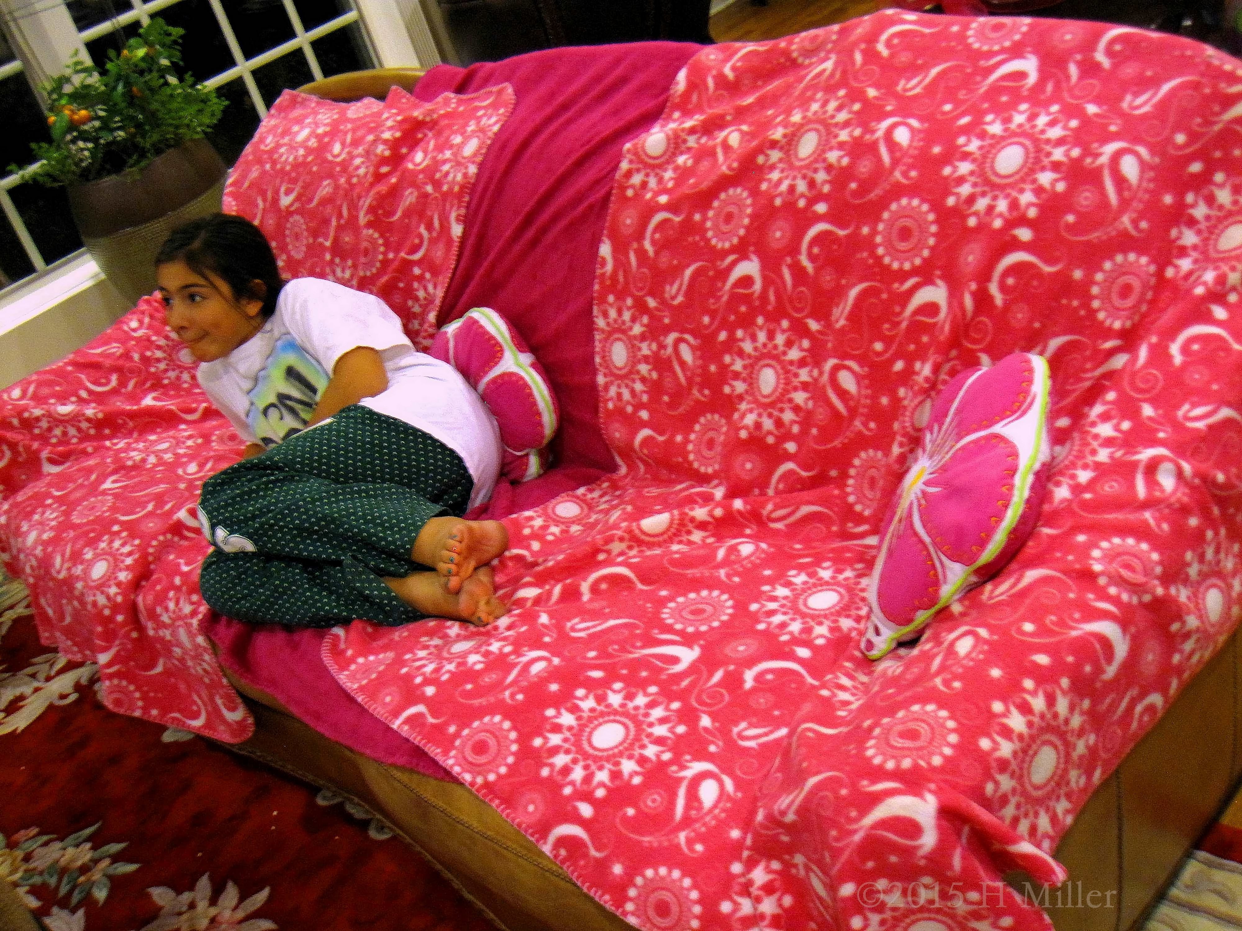 Watching TV On The Couch Waiting For The Kids Spa Party To Start Watching TV On The Couch Waiting For The Kids Spa Party To Start