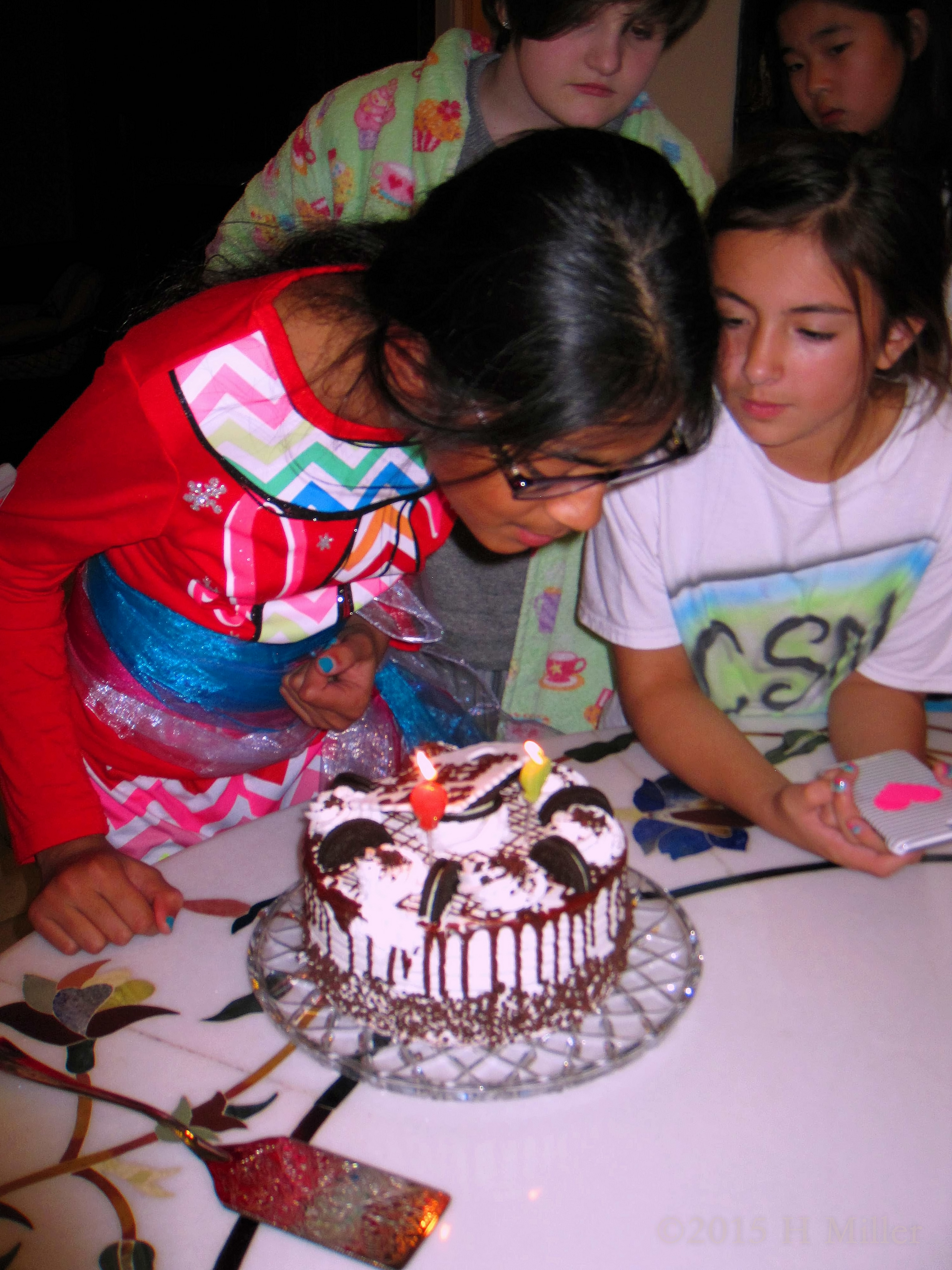 Blowing Out The Candles On Her Birthday Cake Now! 