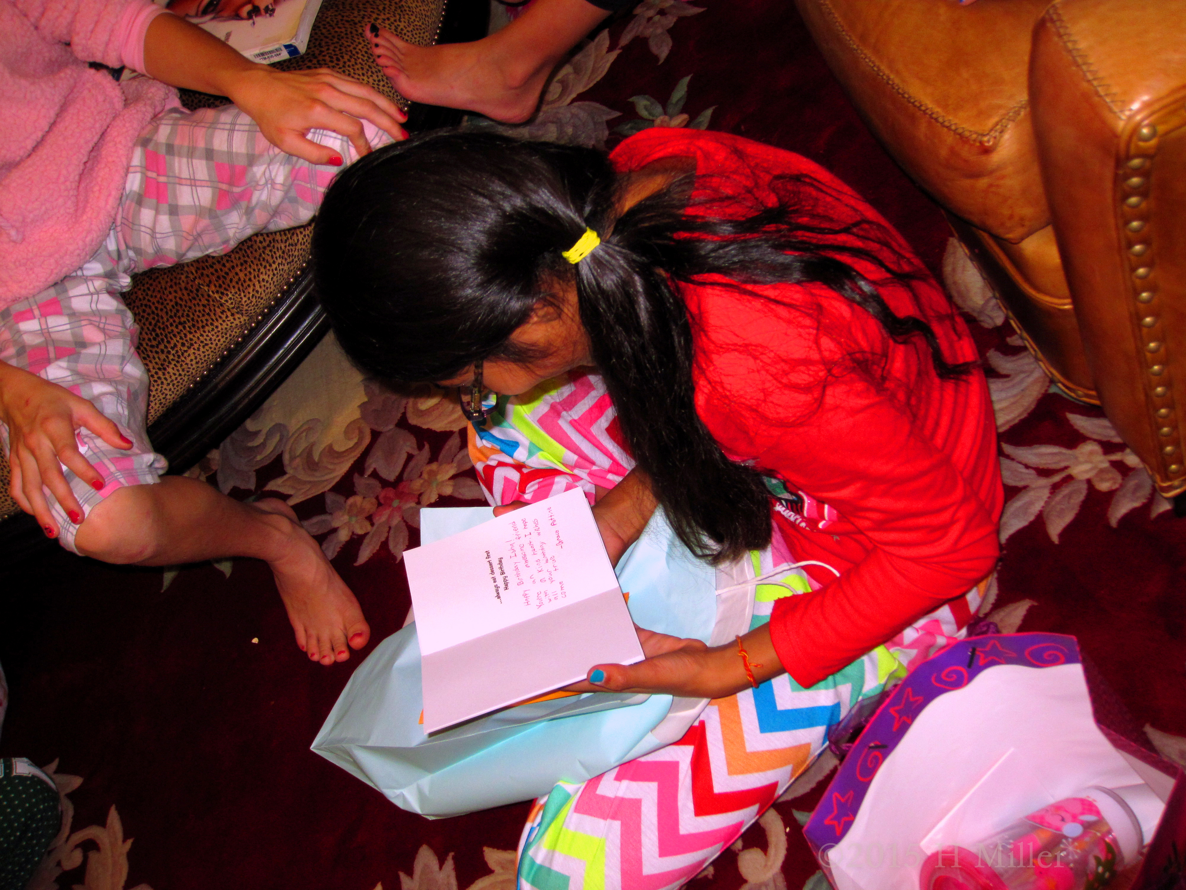 Checking Out The Card On Her Next Present Checking Out The Card On Her Next Present
