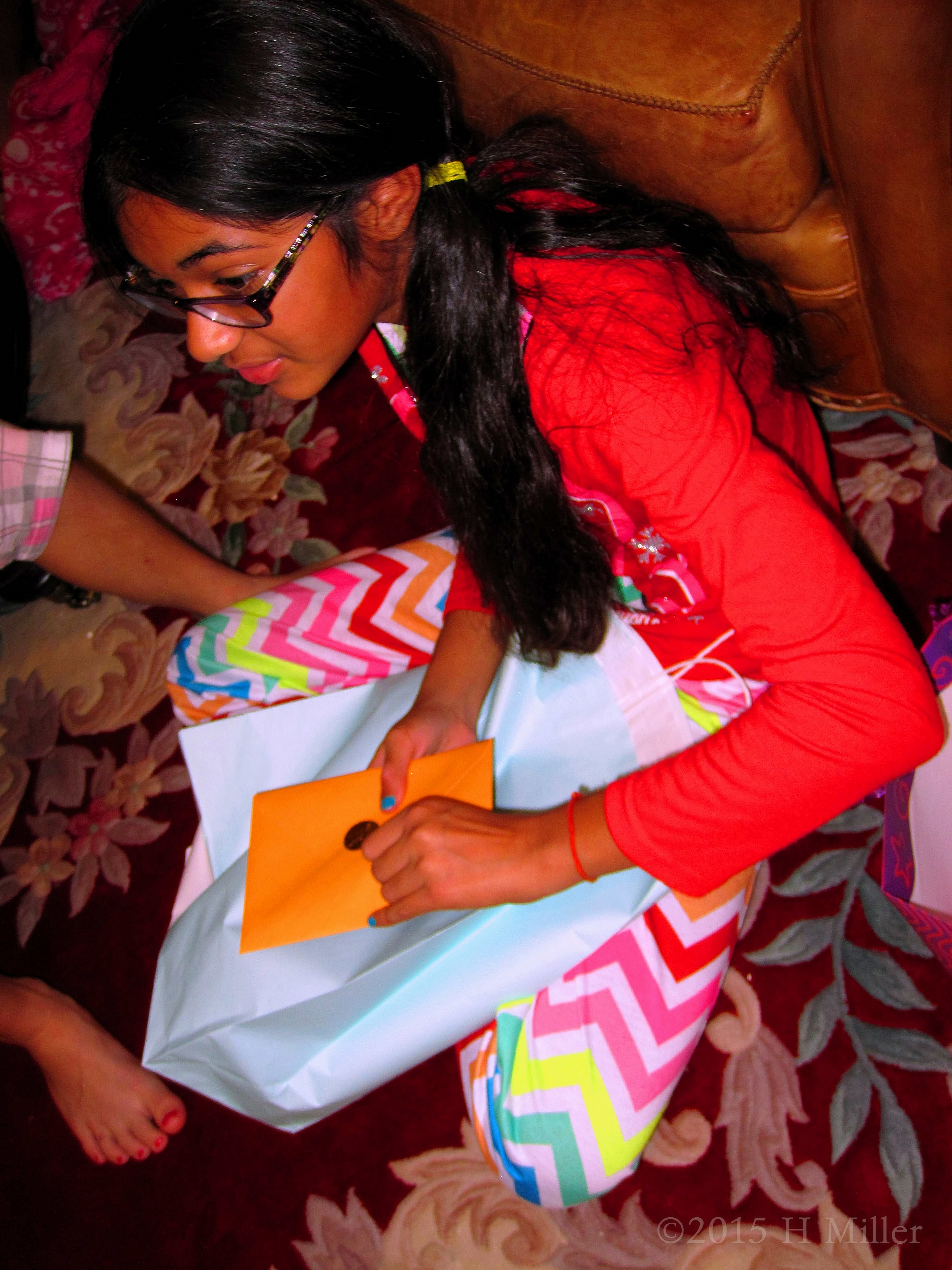 Opening Another Gift At Her Kids Spa Party Opening Another Gift At Her Kids Spa Party