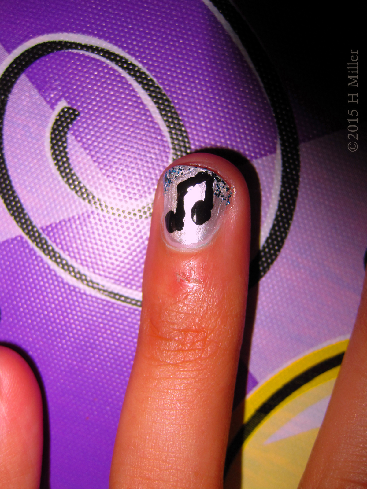 Music Notes Nail Art Design On Silver Background Super Close Up 