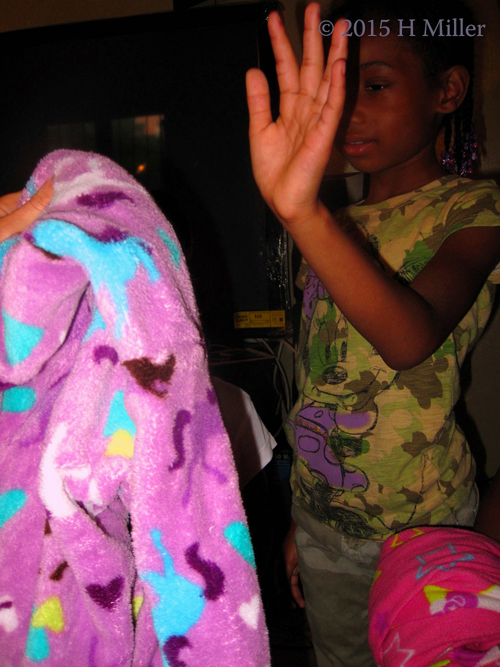 A Purple And Pink And Blue Horse Patterned Robe